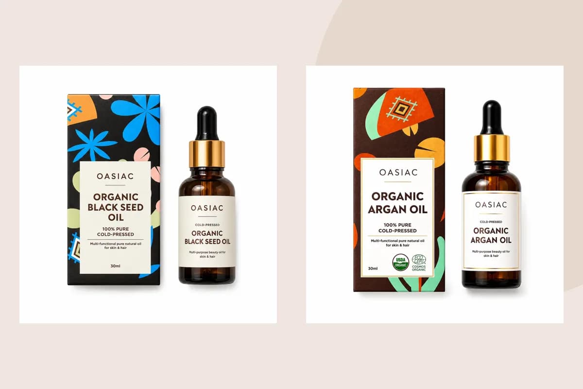 Produktverpackung aus reinem Schwarzkümmelöl und reinem Arganöl von OASIAC